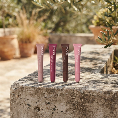 Nourishing Peptide Lip Tint Set with a glossy wash of color and deep hydration.