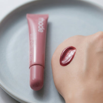 Nourishing Peptide Lip Tint Set with a glossy wash of color and deep hydration.